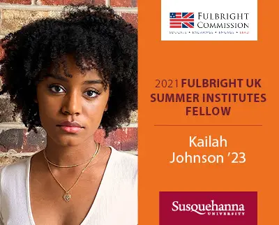 Woman with curly hair stands in front of a brick wall on the left. Text on the right reads: "2021 Fulbright UK Summer Institutes Fellow, Kailah Johnson '23, Susquehanna University." Logos for Fulbright Commission and Susquehanna University are present.
