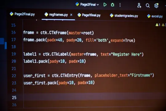 A computer screen displaying part of a Python program. The code snippet includes custom Tkinter (ctk) objects like CTkFrame, CTkLabel, and CTkEntry, along with methods like pack(). The text includes "Register Here" and "First Name".