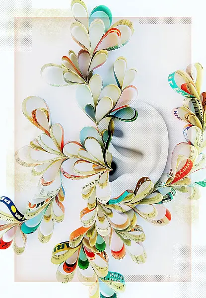 A creative composition featuring an ear surrounded by intricately curved paper strips formed into abstract floral shapes. The papers are printed with text and exhibit various colors, adding a vibrant and dynamic feel to the artwork.