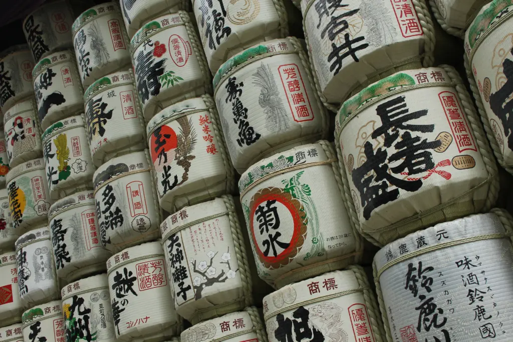 Stacks of traditional Japanese sake barrels, wrapped in straw and adorned with vibrant designs, stand as testament to the rich cultural exchange one can experience when choosing to study abroad. Each barrel, featuring ornate calligraphy, is more than an offering—it's a glimpse into a world awaiting exploration.