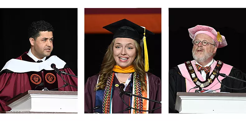 Three people in academic regalia stand at podiums: a man in a maroon gown, a woman in a graduation cap and gown, and a man in a pink academic robe and cap, each speaking at a commencement ceremony.